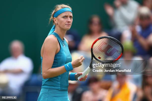 Petra Kvitova of the Czech Republic celebrates winning the first set during her singles semi-final match against Mihaela Buzarnescu of Romania during...