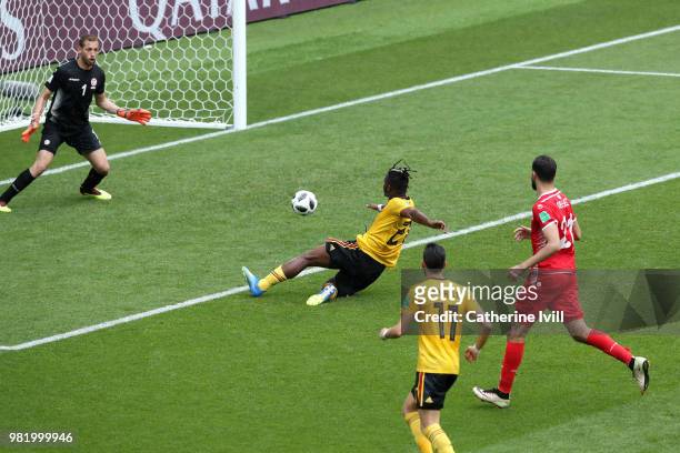 Michy Batshuayi of Belgium scores past Farouk Ben Mustapha of Tunisia his team's fifth goal during the 2018 FIFA World Cup Russia group G match...