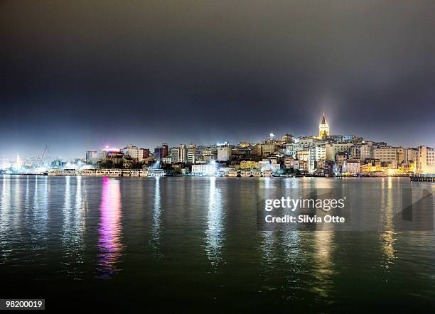 istanbul at night, view from galata bridge - silvia otte stock pictures, royalty-free photos & images