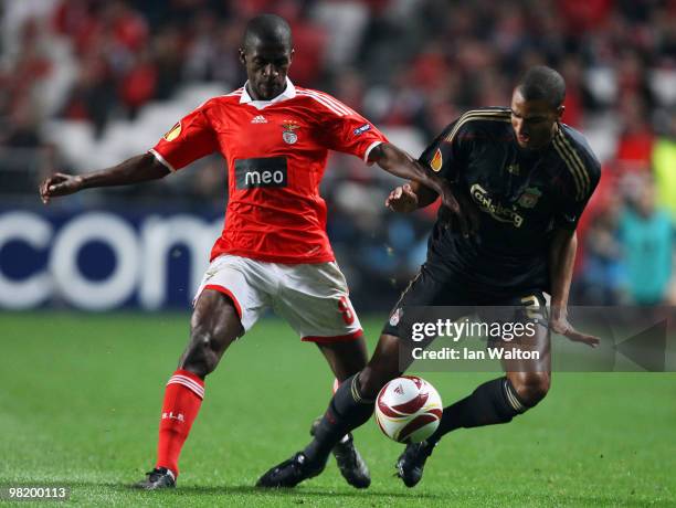 Ramires of Benfica tries to tackle David Ngog of Liverpool during the UEFA Europa League quarter final first leg match between Benfica and Liverpool...