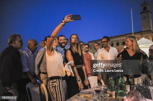 Italian Minister of the Interior and Leader of the Lega Nord Party Matteo Salvini takes a selfie photo during a campaign rally for the ballot on June...