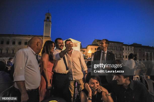 Italian Minister of the Interior and Leader of the Lega Nord Party Matteo Salvini takes a selfie photo during a campaign rally for the ballot on June...