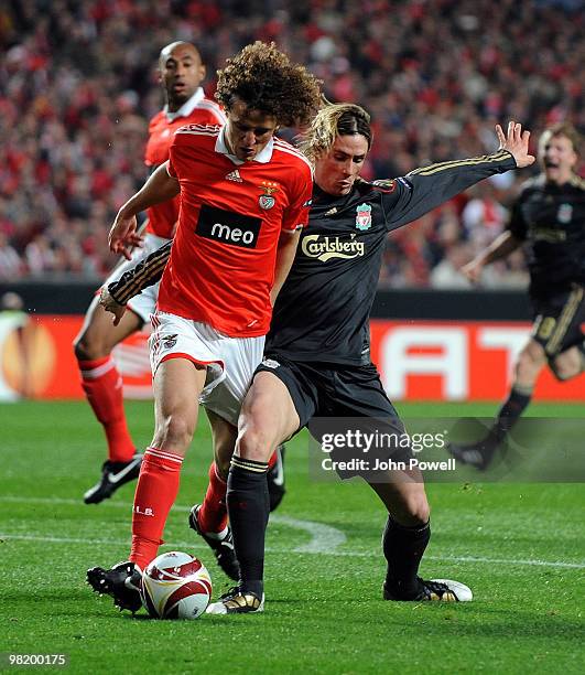 Fernando Torres of Liverpool competes with David Luiz of Benfica during the first leg of the UEFA Europa League quarter finals between Benfica and...