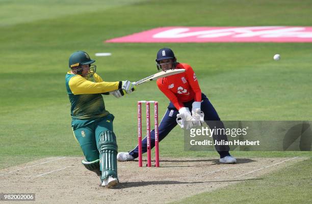 Sarah Taylor of England looks on as Lizelle Lee of South Africa scores runs during the International T23 Tri-Series match between England Women and...