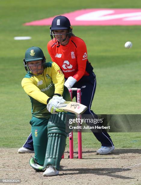 Sarah Taylor of England looks on as Lizelle Lee of South Africa scores runs during the International T23 Tri-Series match between England Women and...