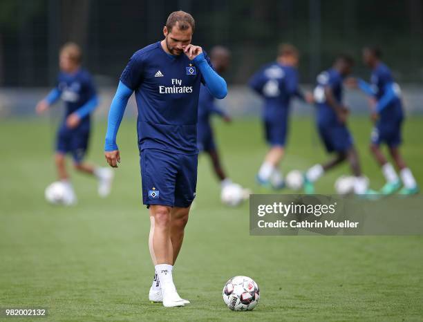 Pierre-Michel Lasogga looks down during the first training session of the new season at Volksparkstadion on June 23, 2018 in Hamburg, Germany....