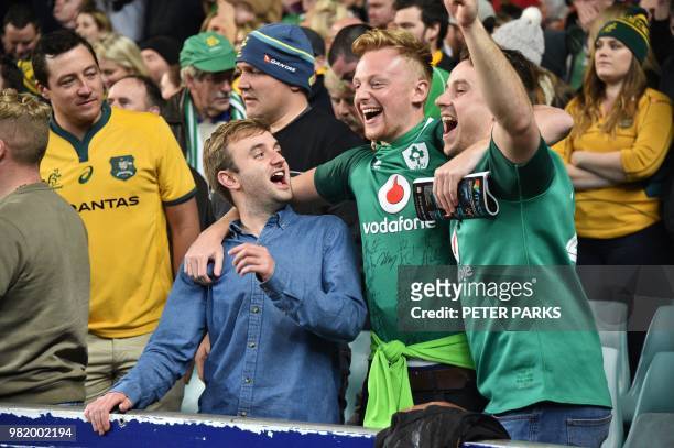 Ireland rugby fans celebrate their team winning the Lansdown Cup after beating the Australian Wallabies 20-16 during the third and final rugby union...