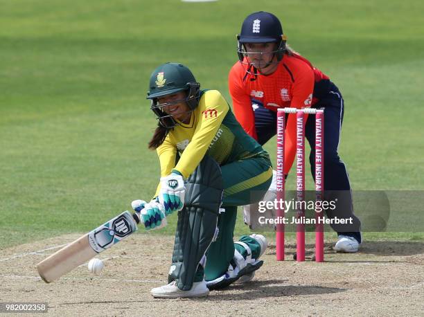 Sarah Taylor of England looks on as Sune Luus of South Africa scores runs during the International T23 Tri-Series match between England Women and...