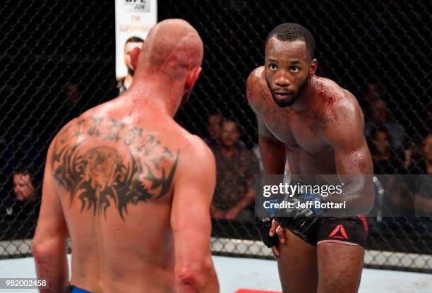 Leon Edwards of Jamaica taunts Donald Cerrone in their welterweight bout during the UFC Fight Night event at the Singapore Indoor Stadium on June 23,...