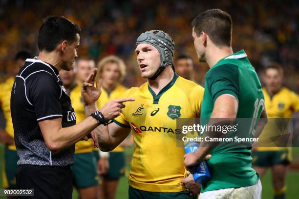 Referee Pascal Gauzere of France talks to David Pocock of the Wallabies and Johnny Sexton of Ireland during the Third International Test match...