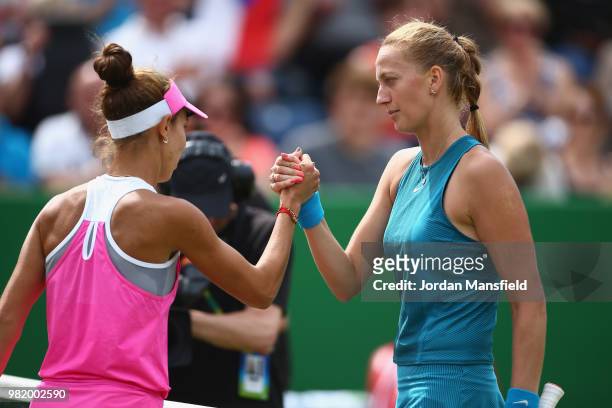 Petra Kvitova of the Czech Republic shakes hands with Mihaela Buzarnescu of Romania after her victory during her singles semi-final match against...