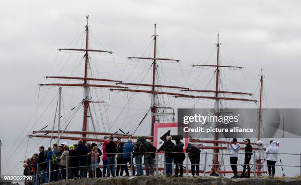 June 2018, Germany, Kiel: The Russian four-master 'Sedov' is on the Fjord during the windjammer parade at the Kieler Woche . There are considerably...