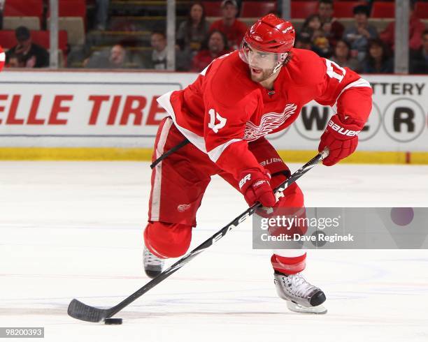 Patrick Eaves of the Detroit Red Wings skates with the puck during an NHL game against the Edmonton Oilers at Joe Louis Arena on March 30, 2010 in...