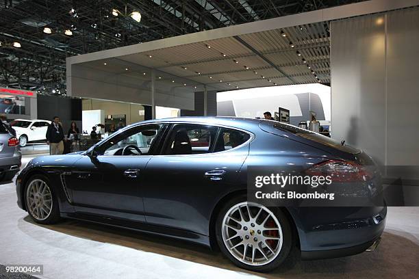 Porsche Panamera Turbo sits on display during a media preview of the New York International Auto Show in New York, U.S., on Thursday, April 1, 2010....