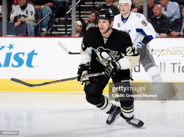 Craig Adams of the Pittsburgh Penguins skates against the Tampa Bay Lightning on March 31, 2010 at Mellon Arena in Pittsburgh, Pennsylvania.