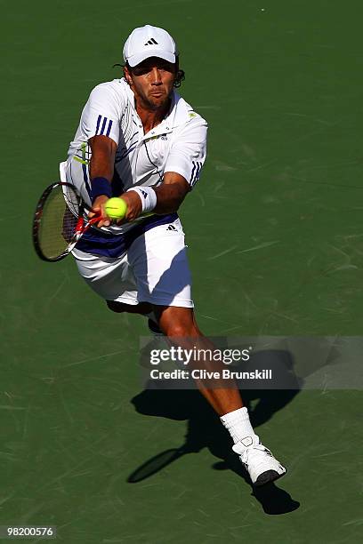 Fernando Verdasco of Spain returns a shot against Tomas Berdych of the Czech Republic during day ten of the 2010 Sony Ericsson Open at Crandon Park...