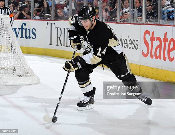 Chris Kunitz of the Pittsburgh Penguins controls the puck against the Tampa Bay Lightning on March 31, 2010 at Mellon Arena in Pittsburgh,...