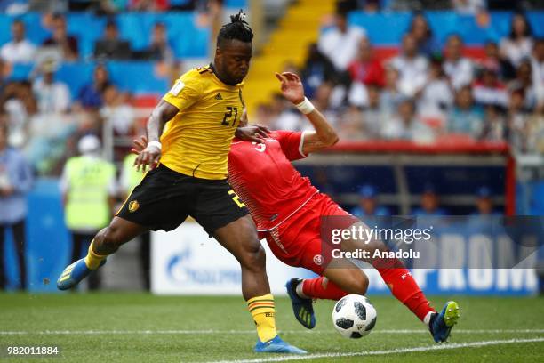 Michy Batshuayi of Belgium in action against Yohan Benalouane of Tunisia during the 2018 FIFA World Cup Russia group G match between Belgium and...