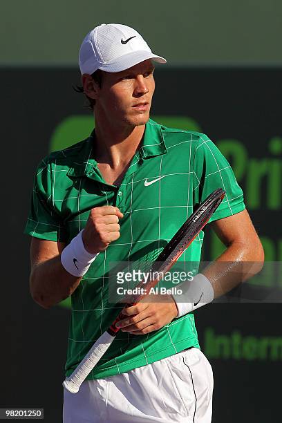 Tomas Berdych of the Czech Republic reacts after a point against Fernando Verdasco of Spain during day ten of the 2010 Sony Ericsson Open at Crandon...