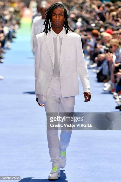 Model walks the runway during the Louis Vuitton Menswear Spring/Summer 2019 fashion show as part of Paris Fashion Week on June 21, 2018 in Paris,...
