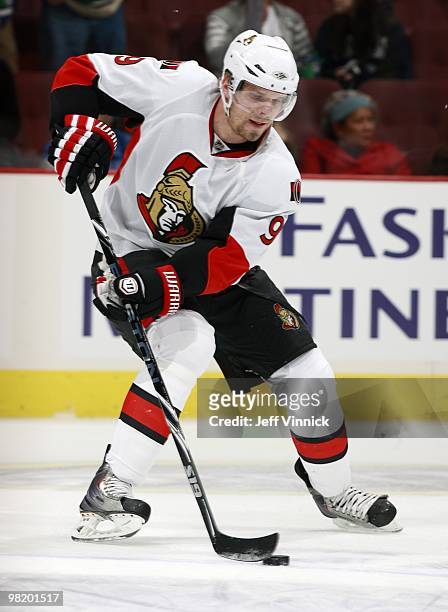 Milan Michalek of the Ottawa Senators skates up ice with the puck during the game against the Vancouver Canucks at General Motors Place on March 13,...