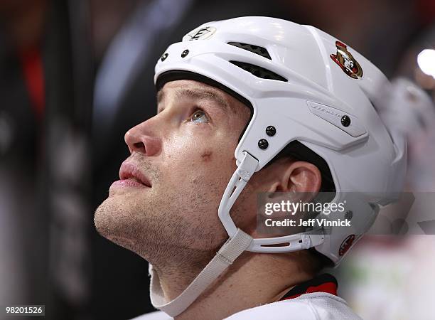 Jarkko Ruutu of the Ottawa Senators looks on from the bench during the game against the Vancouver Canucks at General Motors Place on March 13, 2010...