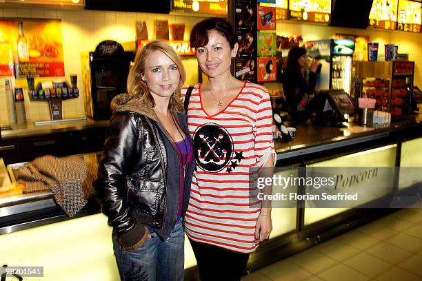 Actress Tina Ruland and actress Carolina Vera Squella attend the premiere of 'Waffenstillstand' at cinema Kulturbrauerei on April 1, 2010 in Berlin,...