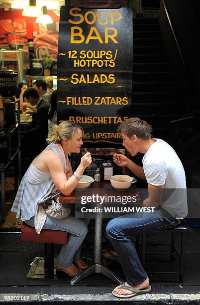 People enjoy their lunch in one of Melbourne's inner-city laneways which is home to many vibrant bars, cafes, restaurants, boutiques, sushi bars and...