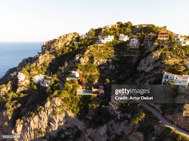 aerial picture taken with drone of the luxury houses in the costa brava shoreline. - debat fotografías e imágenes de stock