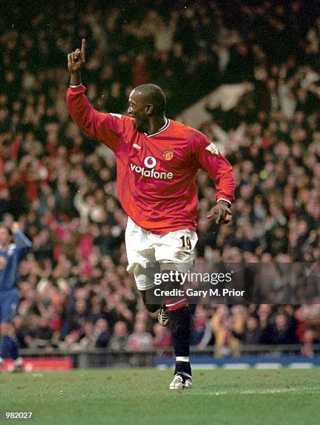 Dwight Yorke of Manchester United celebrates after scoring the first goal during the FA Carling Premiership match between Manchester United v...