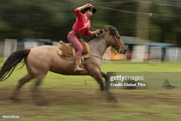 rodeo - brazil (rodeo crioulo) - gaucho festival stock pictures, royalty-free photos & images