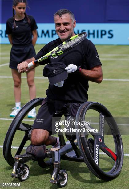 Stephane Houdet of France smiles after winning the men's wheelchair match against Gordon Reid of Great Britain during Day 6 of the Fever-Tree...