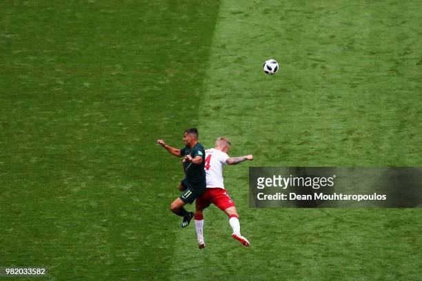 Andrew Nabbout of Australia and Simon Kjaer of Denmark battle for the header ball during the 2018 FIFA World Cup Russia group C match between Denmark...