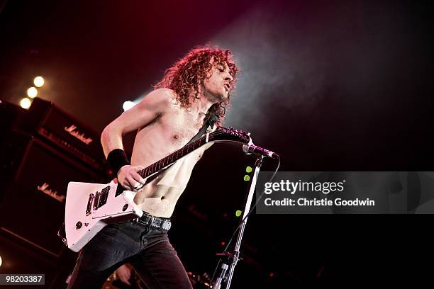 Joel O'Keeffe of Airbourne performs at Hammersmith Apollo on April 1, 2010 in London, England.