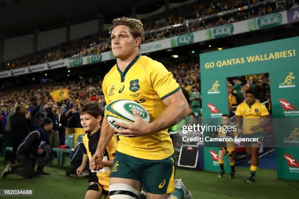 Michael Hooper of the Wallabies leads his team onto the field during the Third International Test match between the Australian Wallabies and Ireland...