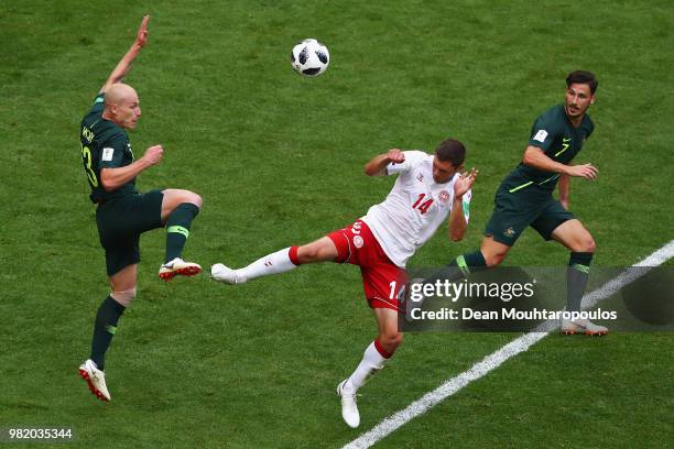 Aaron Mooy of Australia battles for the headed ball with Henrik Dalsgaard of Denmark during the 2018 FIFA World Cup Russia group C match between...