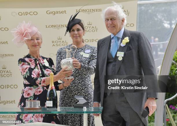 Dame Helen Mirren DBE presents the Hardwicke Stakes Cup to Jessica De Rothschild and Sir Evelyn De Rothschild on day 5 of Royal Ascot at Ascot...