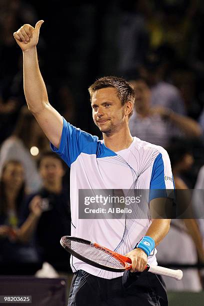 Robin Soderling of Switzerland reacts after defeating Mikhail Youzhny of Russia during day ten of the 2010 Sony Ericsson Open at Crandon Park Tennis...