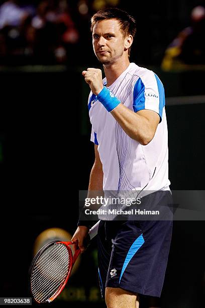 Robin Soderling of Switzerland reacts after defeating Mikhail Youzhny of Russia during day ten of the 2010 Sony Ericsson Open at Crandon Park Tennis...