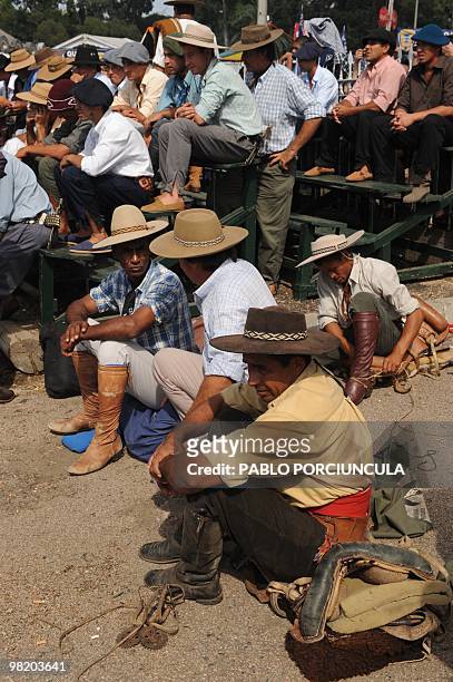 Gauchos chat before a rodeo at the Patria Grande, a festival held every Semana Criolla , also called Easter Week, at the Rural del Prado in...