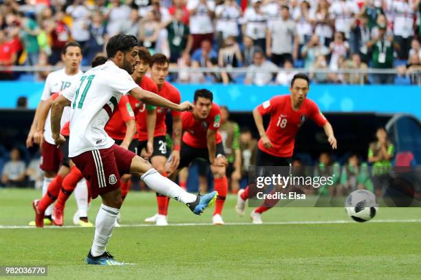 Carlos Vela of Mexico scores his team's first goal from the penalty spot during the 2018 FIFA World Cup Russia group F match between Korea Republic...