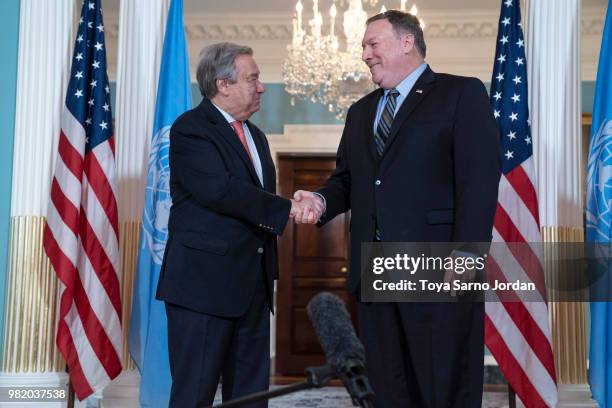 Secretary of State Mike Pompeo shakes hands with United Nations Secretary-General Antonio Guterres, at the Department of State on June 23, 2018 in...