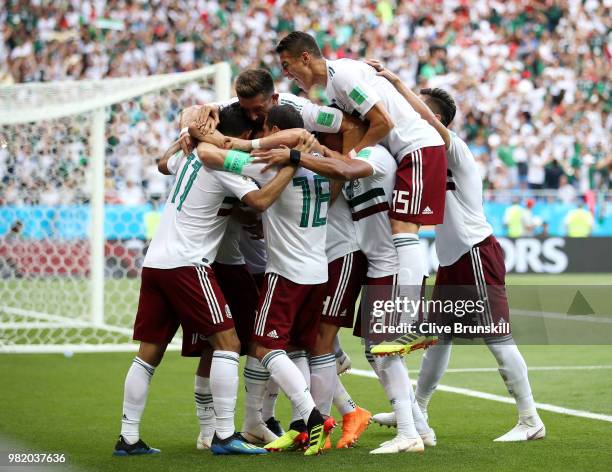 Carlos Vela of Mexico celebrates with teammates after scoring a penalty for his team's first goal during the 2018 FIFA World Cup Russia group F match...