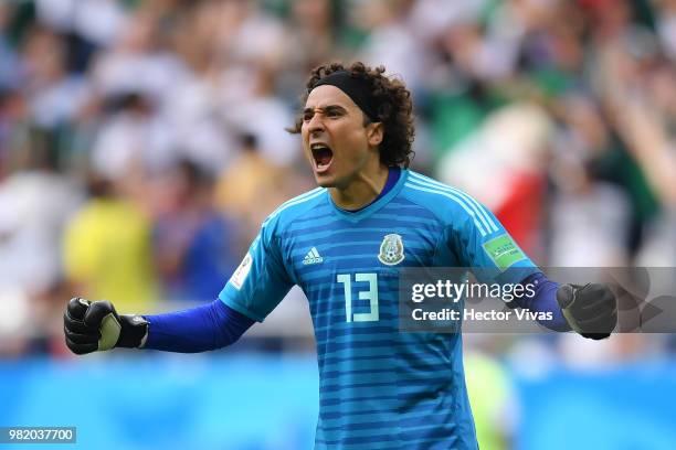 Guillermo Ochoa goalkeeper of Mexico celebrates the opening goal scored by Carlos Vela during the 2018 FIFA World Cup Russia group F match between...