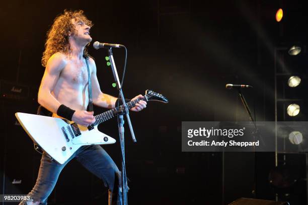 Joel O'Keeffe of Australian rock band Airbourne performs on stage at Hammersmith Apollo on April 1, 2010 in London, England.