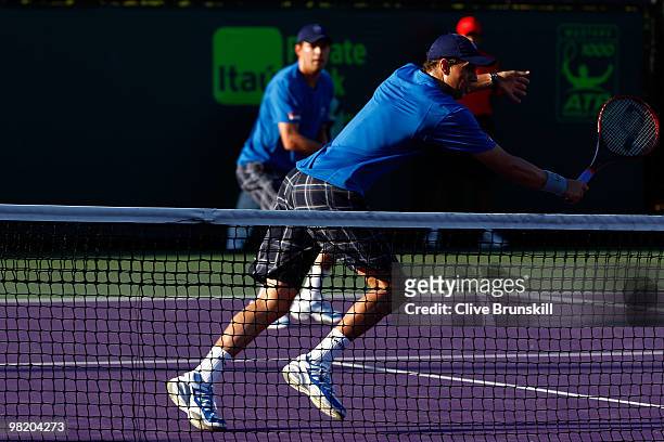 Bob Bryan and Mike Bryan of the United States play against Marcin Matkowski and Mariusz Fyrstenberg of Poland during day nine of the 2010 Sony...
