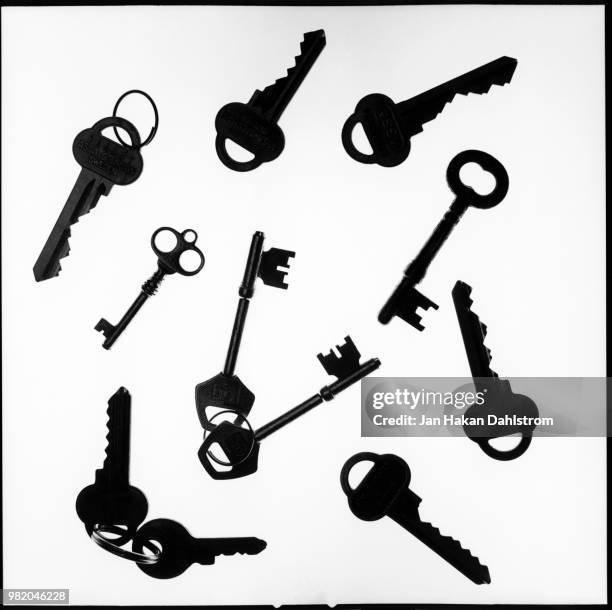 silhouettes of keys - närbild stock pictures, royalty-free photos & images