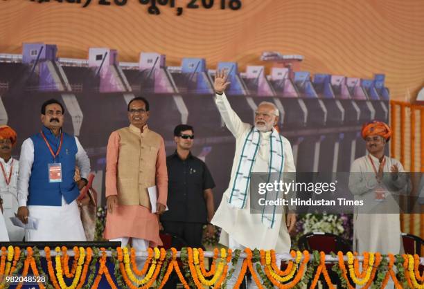 Prime Minister Narendra Modi and Madhya Pradesh chief minister Shivraj Singh Chouhan during an inauguration ceremony of Mohanpura dam project in...