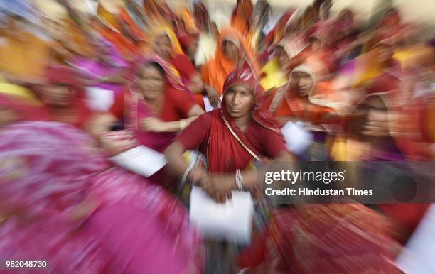 Widows from Rajasthan attend an event organised by the Loomba Foundation marking International Widows Day 2018, at Vigyan Bhawan, on June 23, 2018 in...