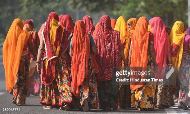 Widows from Rajasthan attend an event organised by the Loomba Foundation marking International Widows Day 2018, at Vigyan Bhawan, on June 23, 2018 in...